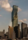 Architectural exterior view of King Power Mahanakhon Building is a mixed-use skyscraper with other modern high-rise buildings