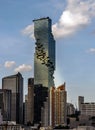 Architectural exterior view of King Power Mahanakhon Building is a mixed-use skyscraper with other modern high-rise buildings