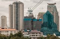 Architectural exterior view of Multiple skyscrapers and Building under construction site with cranes