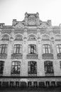 Architectural facade of an ancient brick building with ornament details Royalty Free Stock Photo