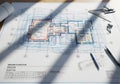 Architectural floor plan blueprint with tools for construction project planning and design Royalty Free Stock Photo