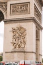 Architectural fragment of Arc de Triomphe. Arc de Triomphe de l\'Etoile on Charles de Gaulle Place is one of the most famous Royalty Free Stock Photo