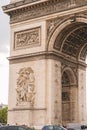 Architectural fragment of Arc de Triomphe. Arc de Triomphe de l\'Etoile on Charles de Gaulle Place is one of the most famous Royalty Free Stock Photo