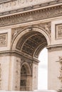 Architectural fragment of Arc de Triomphe. Arc de Triomphe de l\'Etoile on Charles de Gaulle Place is one of the most famous Royalty Free Stock Photo