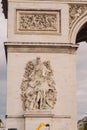 Architectural fragment of Arc de Triomphe. Arc de Triomphe de l\'Etoile on Charles de Gaulle Place is one of the most famous Royalty Free Stock Photo