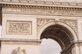 Architectural fragment of Arc de Triomphe. Arc de Triomphe de l\'Etoile on Charles de Gaulle Place is one of the most famous