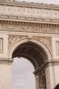 Architectural fragment of Arc de Triomphe. Arc de Triomphe de l\'Etoile on Charles de Gaulle Place is one of the most famous Royalty Free Stock Photo