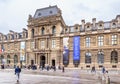 Architectural fragment of one of facades of the museum Louvre