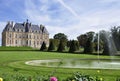 Small castle in large park with pond Royalty Free Stock Photo