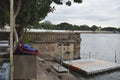 Architectural Heritage Ghat with intricate carvings in stone and steps, side view, Kankaria Lake, was built in the 15th century Royalty Free Stock Photo