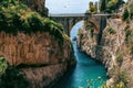 Architectural landmark, stone bridge. A view of the Fiordo of Furore in Amalfi coast, Travel and vacation concept. Summer day.