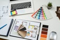 Architectural materials blueprints laptop tools and color sampler for renovation Royalty Free Stock Photo