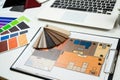 Architectural materials blueprints laptop tools and color sampler for renovation Royalty Free Stock Photo