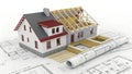 Architectural miniature model resting on construction blueprints, revealing design development stages Royalty Free Stock Photo