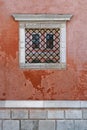 Architectural photography about a authentic mediterranean italian house: another window appears in the window on the wall