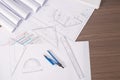 Architectural plan project drawing with blueprints rolls. Royalty Free Stock Photo