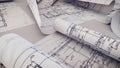 Architectural project, blueprints, blueprint rolls on plans. Royalty Free Stock Photo