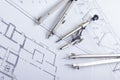 Architectural project, blueprints and divider compass on plans Engineering tools view from the top. Cop Royalty Free Stock Photo