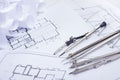 Architectural project, blueprints and divider compass on plans Engineering tools view from the top. Cop Royalty Free Stock Photo