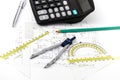 Architectural project, pair of compasses, rulers and calculator Royalty Free Stock Photo