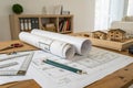 Architectural project with rolled-up construction and technical drawings Royalty Free Stock Photo