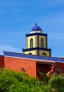 Architectural rooftops in Playa Las Americas in Teneriffe featuring tiled mosaic domes and terracotta tiles in retro Moorish style