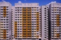 Architectural shot of public housing HDB flats in Singapore on sunny day. Dynamic angle; abstract; graphic; background Royalty Free Stock Photo