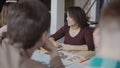 Architectural start-up company. Young creative team working in loft office. African woman talking with group of people. Royalty Free Stock Photo