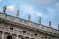 Architectural statues on the ancient buildings in Venice old city, Italy Royalty Free Stock Photo