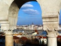 Stone arch in Budapest with the Parliament in the distance Royalty Free Stock Photo