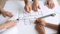 Architectural Team Collaborating on a Blueprint Royalty Free Stock Photo