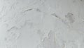 Architectural texture of cracked horizontal concrete wall with rough surface and visible decay for visual reference and digital Royalty Free Stock Photo