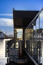 Architecture in Aalesund, Norway showing contrast between old and new buildings against the blue sky Royalty Free Stock Photo