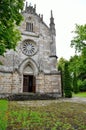 Architecture of ancient Catholic church in the neo-Gothic style Royalty Free Stock Photo