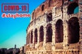 Architecture and arches of the Colosseum in Rome, Italy with sign stayhome regarding Covid-19