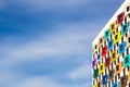 Architecture on a background of blue sky with clouds. Modern residential development. Residential apartment building with a Royalty Free Stock Photo