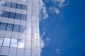 Architecture background fragment of a modern office building against blue sky Royalty Free Stock Photo