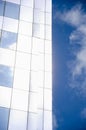 Architecture background, fragment of a modern office building against blue sky Royalty Free Stock Photo