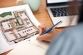 Architecture blueprint, notebook hands writing and woman working on real estate and construction plan. Engineering Royalty Free Stock Photo