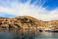 Architecture and boats on the Greek island of Symi. Royalty Free Stock Photo