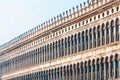 Architecture of buildings in Venice, typical windows and columns in the Piazza San Marco Royalty Free Stock Photo