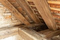 Corner details of very old roof framework - see graved signs in the wood Royalty Free Stock Photo