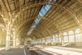 Architecture curved arches, metal struts and glass roof, interior details at empty train station Royalty Free Stock Photo