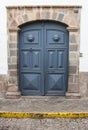 Architecture detail of colonial home door in historical area Cuzco Peru Royalty Free Stock Photo