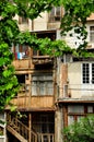 An architecture detail of house in Tbilisi, Georgia. Local building style wooden balconies Royalty Free Stock Photo