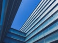 Architecture details Modern building Exterior Glass facade Blue sky