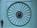 Architecture detail of old lion door knocker