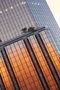 Architecture, glass windows and skyscraper building with sunrise reflection of industrial construction. Aerial view of Royalty Free Stock Photo