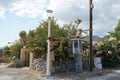 Public call box, cardphone, is standing on the side of the road. Rhodes Island, Greece