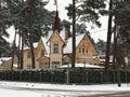 Architecture of houses built of wood, snowy, resort city of Jurmala. Latvia, spring 2018 Royalty Free Stock Photo